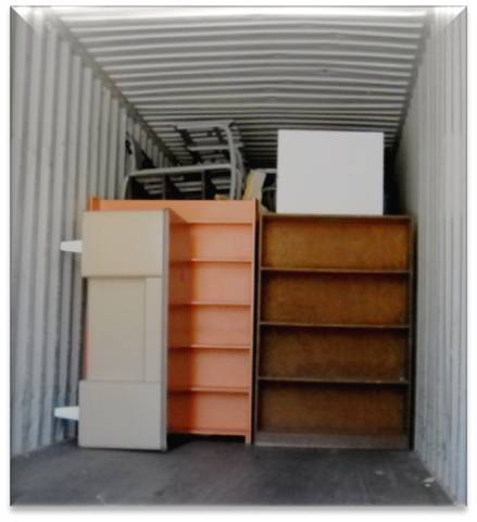 Corporate Interiors combines Drexel's material with surplus from other clients to ship full trailer loads to charity.